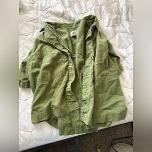 In excellent condition, having been worn four times. Summer wear button-up shirt
